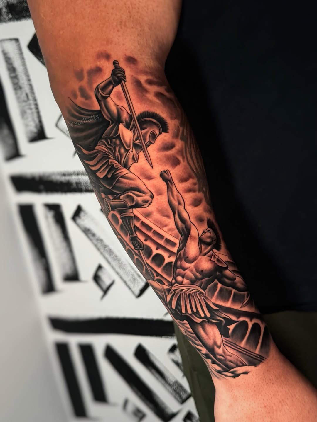 Gladiator battle scene tattoo