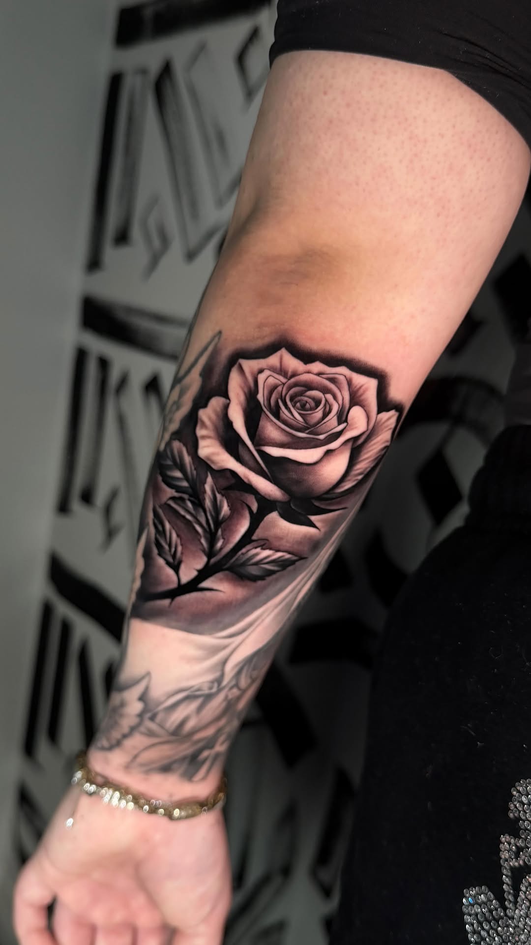 Rose forearm black and grey realism